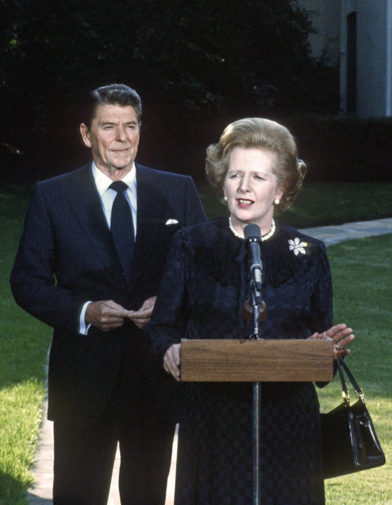 Prime Minister Margaret Thatcher of the United Kingdom, right, makes remarks as United States President Ronald Reagan looks on following their meeting at the White House in Washington, D.C. on Wednesday, June 23, 1982. Thatcher died from a stroke at 87 on Monday, April 8, 2013. Credit: Howard L. Sachs - CNP