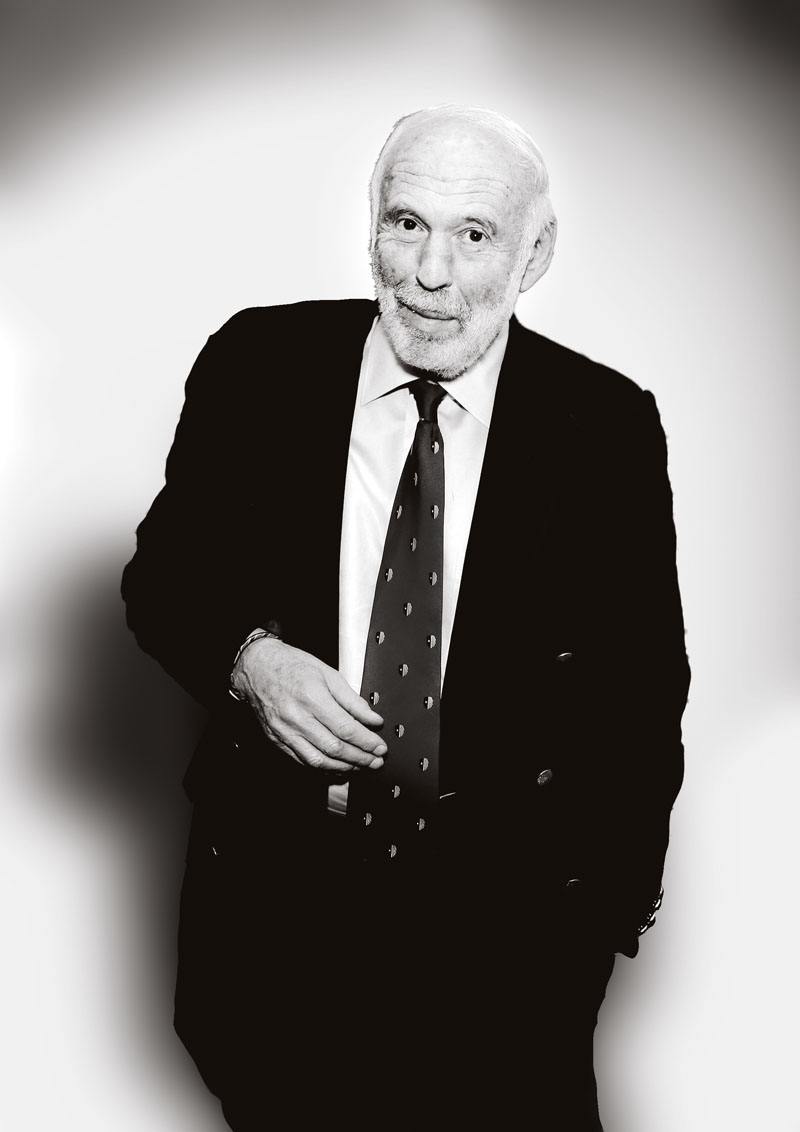 NEW YORK, NY - APRIL 16: Philanthropist Jim Simons poses for a photo with a lemur from Madagascar at the Stars of Stony Brook Gala 2014 at Chelsea Piers on April 16, 2014 in New York City. (Photo by Andrew Toth/Getty Images)