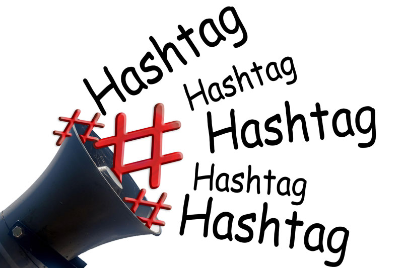 JP2X0K Megaphone and symbol # hashtag # red on white background.