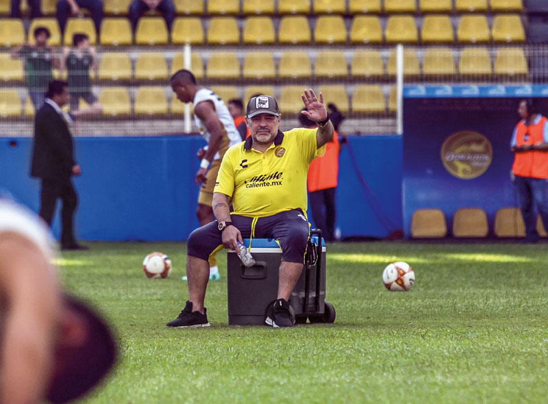 Argentine legend Diego Maradona, coach of Mexican second-division club Dorados, gives instructions to the players during a match against Universidad de Guadalajara, at the Banorte stadium in Culiacan, Sinaloa State, Mexico, on September 29, 2018. (Photo by RASHIDE FARIAS / AFP) (Photo credit should read RASHIDE FARIAS/AFP/Getty Images)