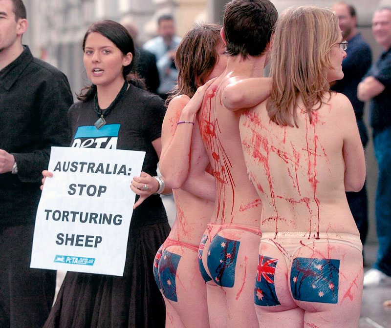 Semi Naked protesters covered in blood holding a protest outside the Australian Embassy Wednesday October 19 2005 against the wool industry's refusal to embrace a landmark agreement between PETA US and a prominent group of wool producers that would have resulted in an immediate reduction of lamb mutilations and an end to PETA,s international boycott campaign Watch For PA Story . PRESS ASSOCIATION. PHOTO.PHOTO CREDIT SHOULD READ Michael Stephens/PA (Photo by Michael Stephens - PA Images/PA Images via Getty Images)