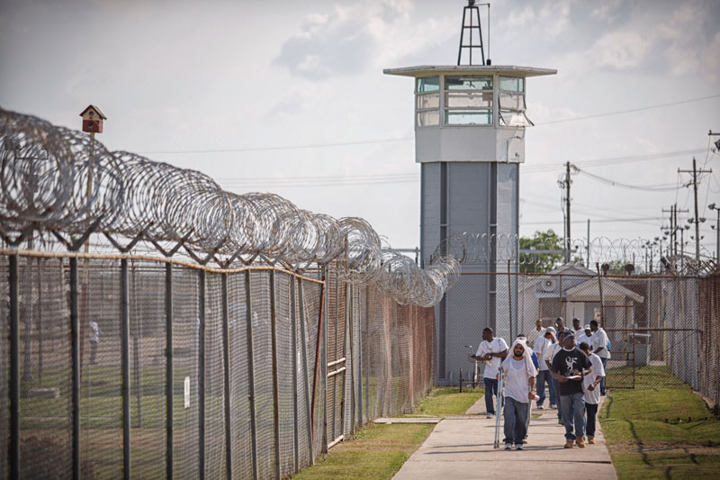 May 2, 2012 - Angola, Louisiana USA: Bobby Wallace, serving 20 years for armed robbery, who plays Jesus, leads a line of his fellow offender actors back to their dormitory after practice in Angola, Louisiana Tuesday May 1, 2012. 70 offenders from Angola and the Louisiana Correctional Institute for Woman perform in the “The Life of Jesus Christ,” a three and a half hour play in the Louisiana State Penitentiary's rodeo arena on the 18,000 acre prison farm on the Mississippi River. (Michael Stravato/POLARIS) ///