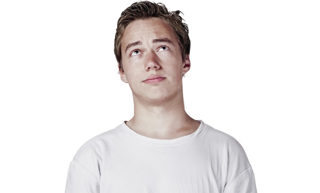 Portrait of teenage boy (16-17) looking up